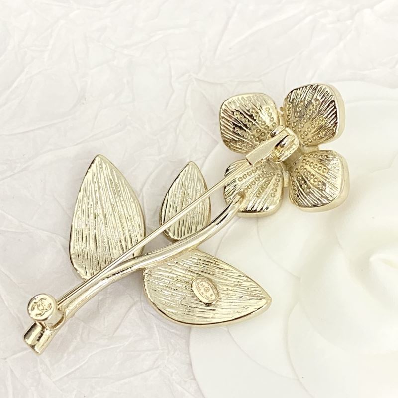 Ch**el brooches